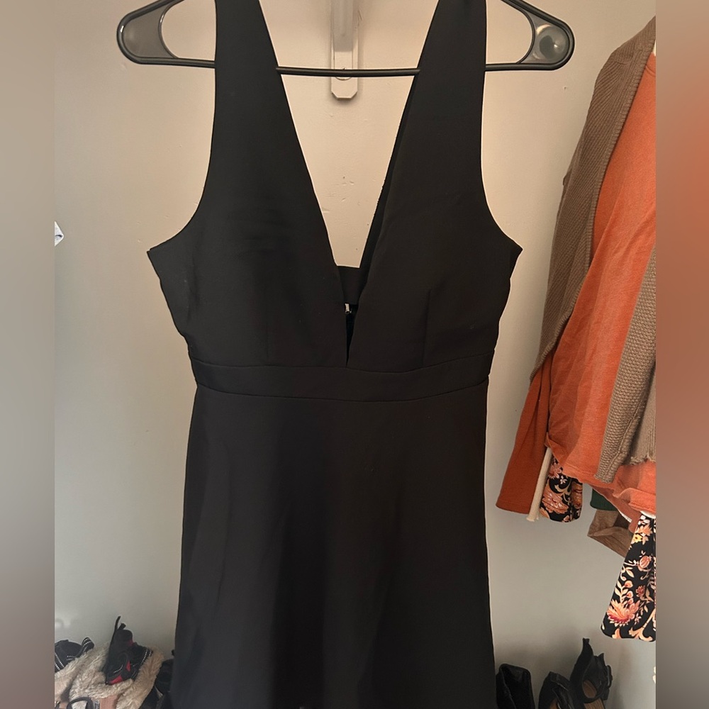 Cute little black dress. Wore once for a Christmas party.